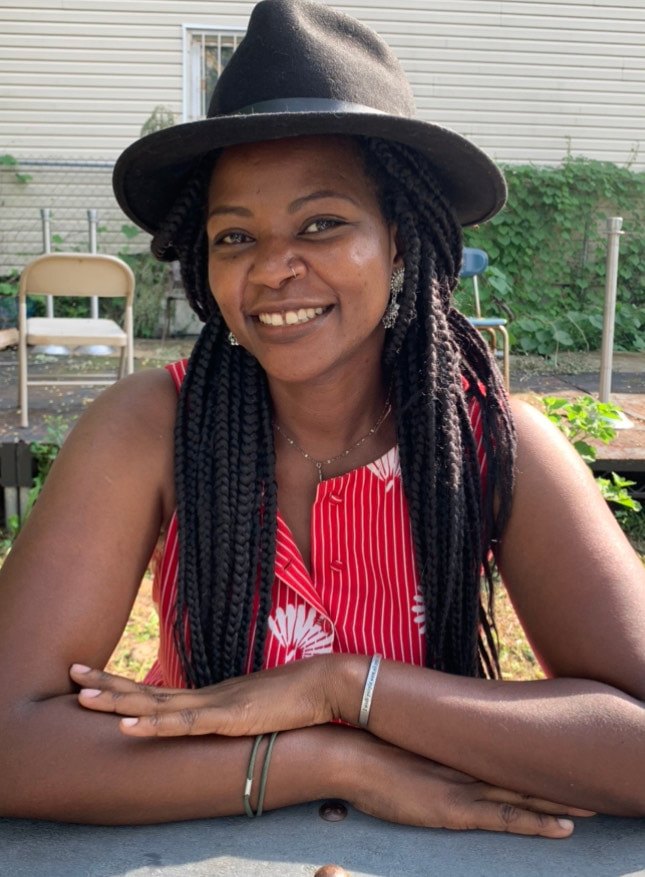 Black female farmer Ashanti Williams of Blackyard Farm Cooperative on the Positively Green Podcast